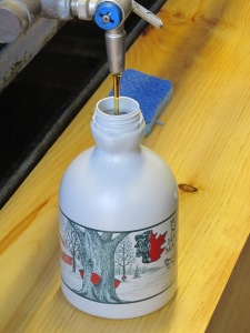 Maple Syrup hot from the spigot at Harding Hill